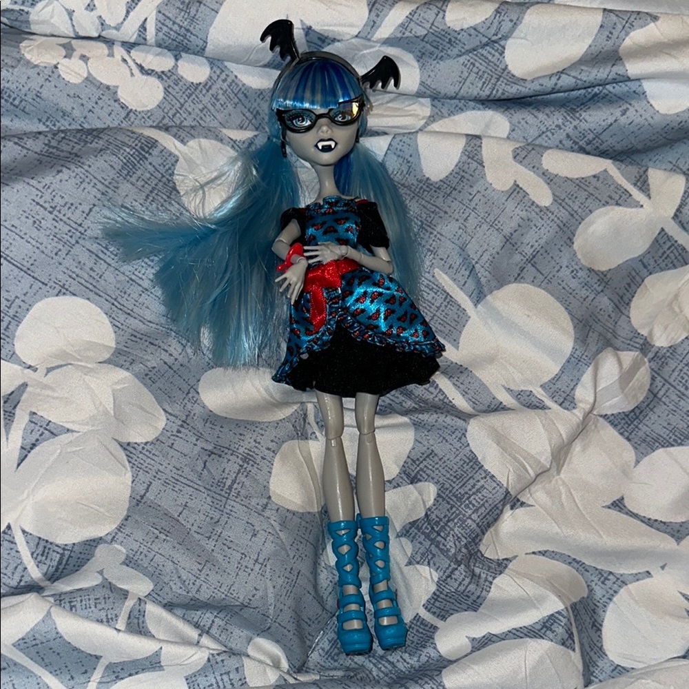 Blue and Black Doll with Red Accent